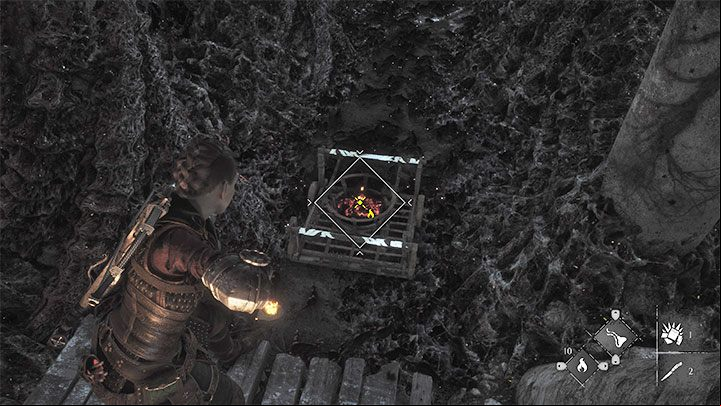 Find the cart at the bottom and set its basket on fire using Ignifer - A Plague Tale Requiem: Chapter 11, Open the gate - walkthrough - Chapter 11 - The Cradle of Centuries - A Plague Tale Requiem Guide, Walkthrough