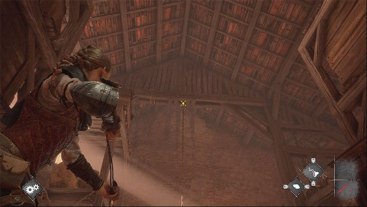 Go downstairs and aim your slingshot at the hook near the ceiling (attached screenshot) - Plague Tale Requiem: Chapter 3, Escape the fort - walkthrough - Chapter 3 - A Burden of Blood - A Plague Tale Requiem Guide, Walkthrough