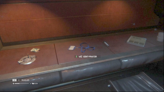 An ID Tag lies on a shelf in a room - Lorenz Systech Spire - Missing persons and Archive Logs - Alien: Isolation - Game Guide and Walkthrough