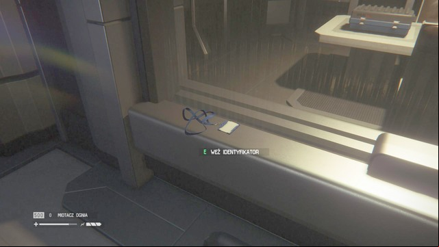An ID Tag lies next to the two-way mirror in the interrogation room in Solomons Habitation Tower - Solomons Habitation Tower - Missing persons and Archive Logs - Alien: Isolation - Game Guide and Walkthrough