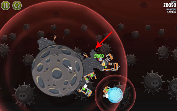 Launch the first bird above the indicated terrain - Level 3-14 - Danger Zone - Angry Birds Space - Game Guide and Walkthrough
