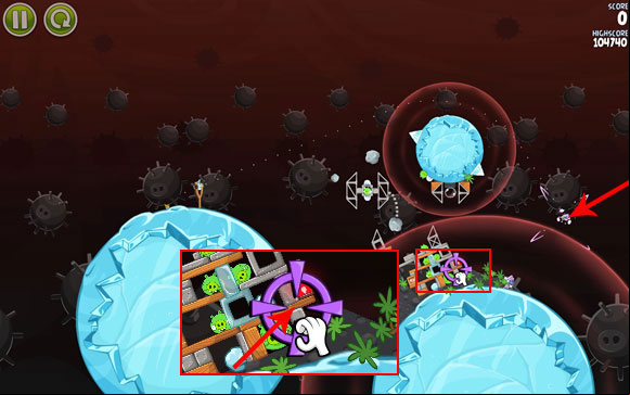 When the bird es the planet and finds itself roughly at the indicated spot, change its course by pointing it at the wooden block on the close-up - Level 3-13 - Danger Zone - Angry Birds Space - Game Guide and Walkthrough