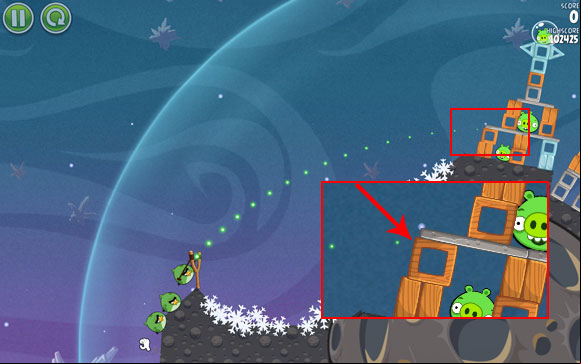 Launch the first bird by adjusting the flight path to go through the spot indicated on the above screen - this will collapse the first structure - Level 2-17 - Cold Cuts - Angry Birds Space - Game Guide and Walkthrough