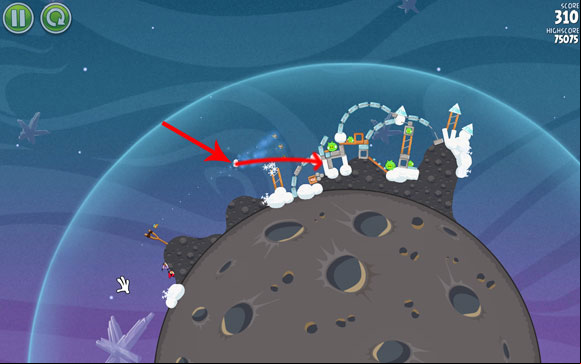 Adjust the first bird's flight path to go right above the pointy spike of the first ice triangle - Level 2-14 - Cold Cuts - Angry Birds Space - Game Guide and Walkthrough