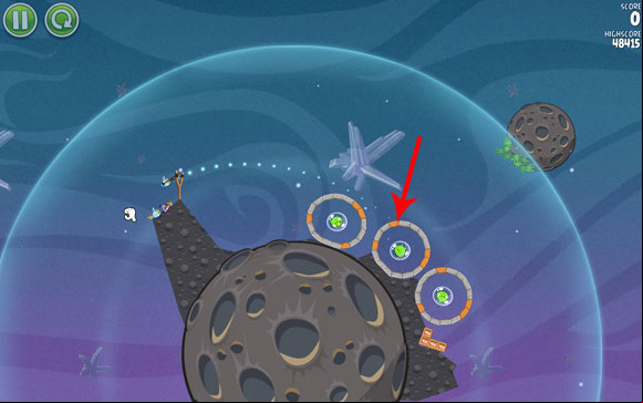 Your first goal is to destroy the wooden block in the second hoop and fly inside it - to freeze the blocks at the bottom - Level 2-5 - Cold Cuts - Angry Birds Space - Game Guide and Walkthrough