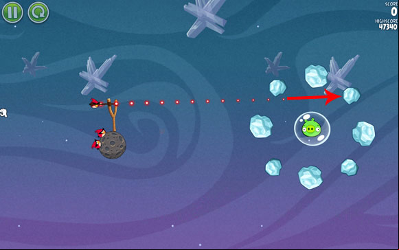 There is a frozen asteroid here; when you hit it, a chain reaction will occur and everything will be destroyed - Level 2-1 - Cold Cuts - Angry Birds Space - Game Guide and Walkthrough