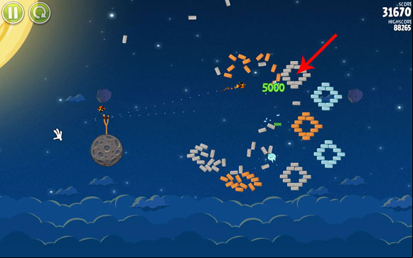 Don't wait too long before firing again, as the level will end - Level 1-14 - Pig Bang - Angry Birds Space - Game Guide and Walkthrough