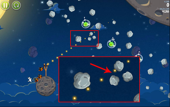 The first solution is to launch the bird between the three smaller asteroids shown on the screen - Level 1-15 - Pig Bang - Angry Birds Space - Game Guide and Walkthrough