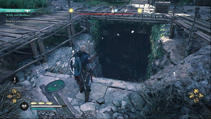 The entrance to the Mithraic Temple leads deep into the ground and then goes through a narrow gap in the wall on the left side - Assassins Creed Valhalla: Walls and Shadows - Lunden - Assassins Creed Valhalla Guide and Walkthrough