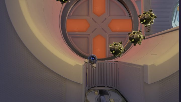 In the round room, fly down and follow the icy tunnel until you reach the room with the dynamite enemy - Astros Playroom: Orbital Obstacles - walkthrough - SSD Highway - Astros Playroom Guide