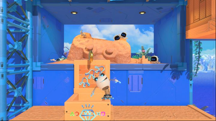 Collect the coins and jump inside the box - Astros Playroom: Springy Spa - walkthrough - Cooling sources - Astros Playroom Guide