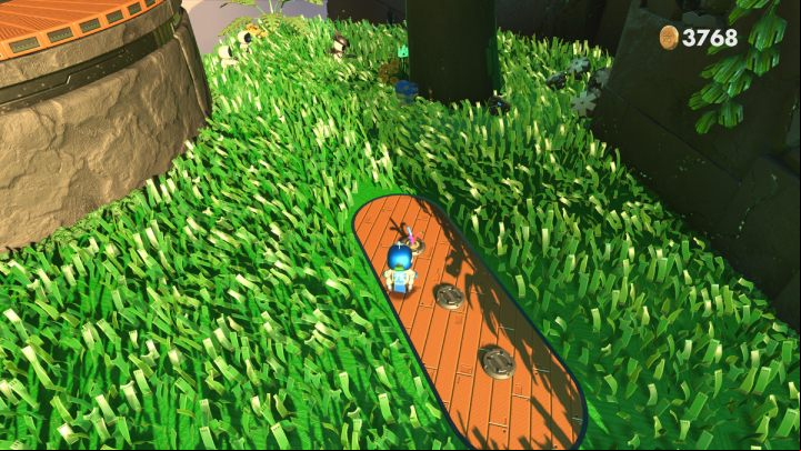 There are coins hidden under the cables by the round platform - Astros Playroom: Renderforest - walkthrough - GPU Jungle - Astros Playroom Guide