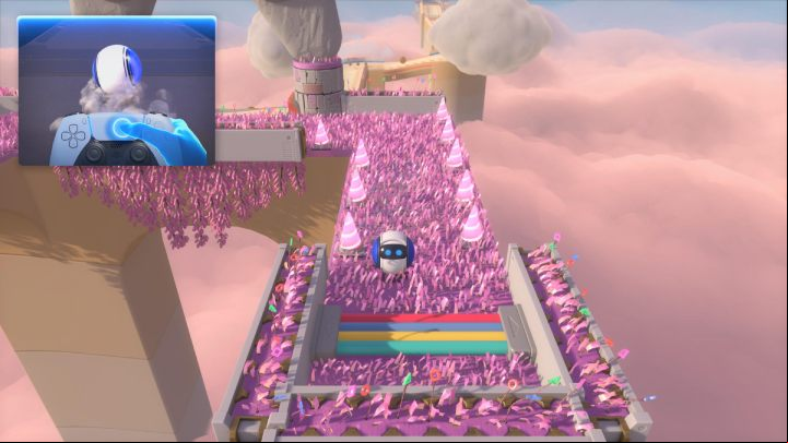 Roll from the grey platforms back onto the pink grass and follow the path to the left - Astros Playroom: Fastlane Fields - walkthrough - Memory Meadow - Astros Playroom Guide