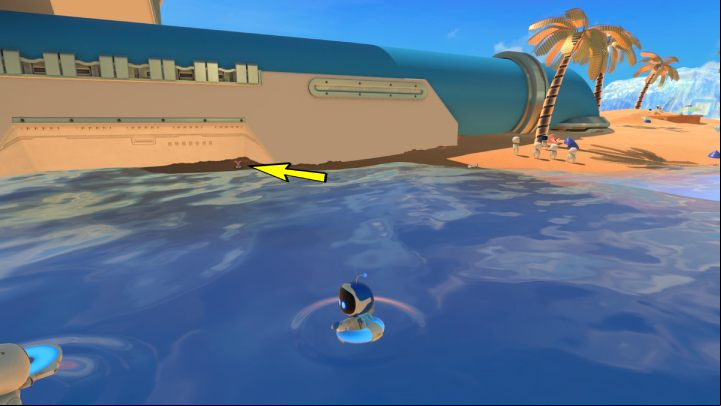 There are wires sticking out of the sand near the big blue pipe - Astros Playroom: Bot Beach - walkthrough - Cooling Springs - Astros Playroom Guide