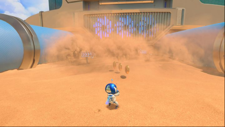 Enter the sandstorm between the blue pipes - Astros Playroom: Bot Beach - walkthrough - Cooling Springs - Astros Playroom Guide