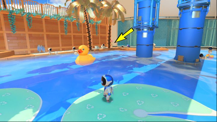 Collect the coins from the palm leaves and then swim to the right end of the pool - Astros Playroom: Bot Beach - walkthrough - Cooling Springs - Astros Playroom Guide