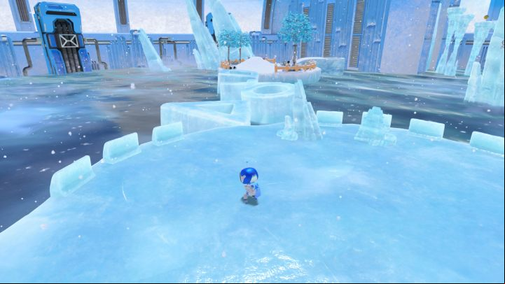 From the ice rink, jump over the ice blocks to a small snowy island - Astros Playroom: Frigid Floes - walkthrough - Cooling Springs - Astros Playroom Guide