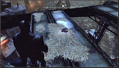 Search for hay on the very top of the drawbridge (screen above) and scan it - Riddles | Amusement Mile - Amusement Mile - Batman: Arkham City Game Guide