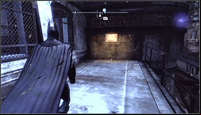 Get onto the balcony ading the Arkham City Processing Center (screen above) - Riddles | Bowery - Bowery - Batman: Arkham City Game Guide
