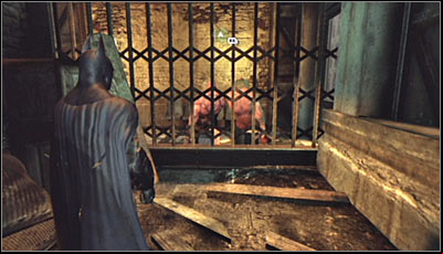 After reaching the destination, scan the Abramovici twins, sitting with their back onto you (screen above) - Riddles | Steel Mill - Steel Mill - Batman: Arkham City Game Guide