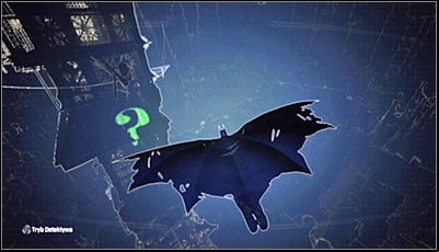 You need to jump off the ledge and glide north - Riddles | Wonder City - Wonder City - Batman: Arkham City Game Guide