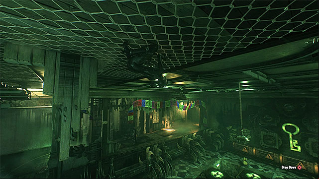 As Catwoman, crawl under the ceiling to reach the game board - Tenth Riddler trial | Batman Arkham Knight - Riddlers Revenge - Batman: Arkham Knight Game Guide & Walkthrough