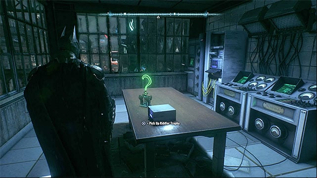 The trophy is lying on the table - Riddler trophies on Bleake Island (19-36) | Collectibles - Bleake Island - Collectibles - Bleake Island - Batman: Arkham Knight Game Guide & Walkthrough