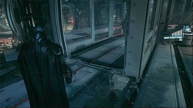 The box will destroy one of the glass walls once you make the airship swing hard enough - Find Scarecrow onboard the second airship | Main story | Batman Arkham Knight - Main story - Batman: Arkham Knight Game Guide & Walkthrough
