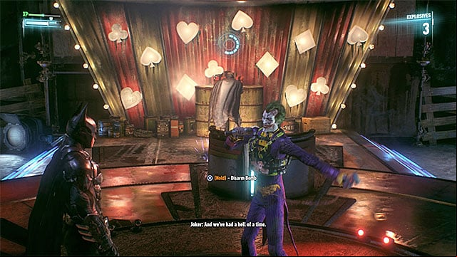 Disarm the bombs when Johnny Charisma is looking away - Johnny Charisma | Boss fights | Batman Arkham Knight - Boss fights - Batman: Arkham Knight Game Guide & Walkthrough