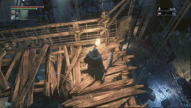 The rope that you can cut to set the opponents below on fire. - Old Yharnam | Walkthrough - Walkthrough - Bloodborne Game Guide & Walkthrough