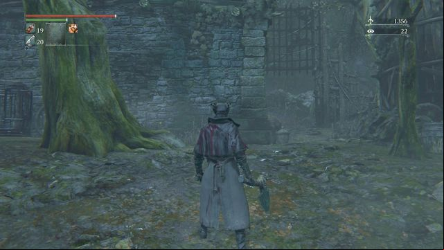 You can open the gate by going past the building from the left, between the dog cages. - Forbidden Woods | Walkthrough - Walkthrough - Bloodborne Game Guide & Walkthrough