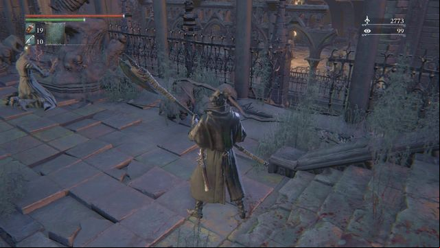 Note: Before you enter the chapel, on the big square, to the right of the fence (the screenshot) there is a gap that you can jump down across (carefully) - Yahargul, Unseen Village | Walkthrough - Walkthrough - Bloodborne Game Guide & Walkthrough