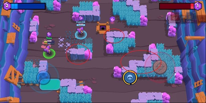 If you want to hide quickly from your opponents attack, run behind the rocks (marked on the screen above) - How can I hide in Brawl Stars? - FAQ - Brawl Stars Guide