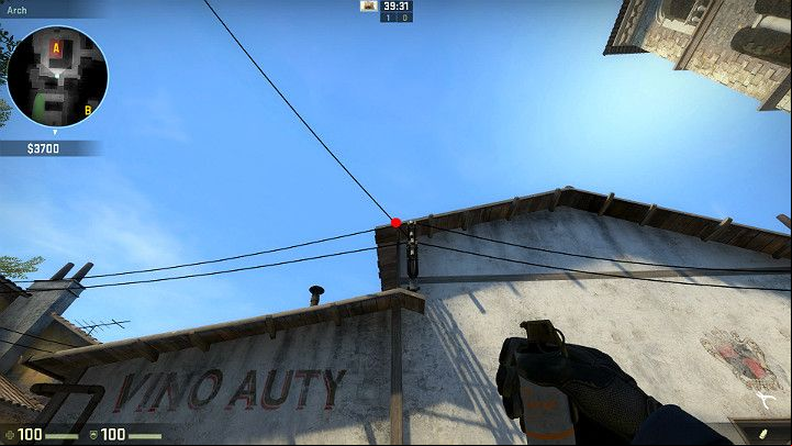 Stand in the presented location and aim at the marked spot (intersection of the cable and the roof) - Inferno | Tournament Maps in CS GO - Tournament Maps in Counter Strike: Global Offensive - CS GO Game Guide
