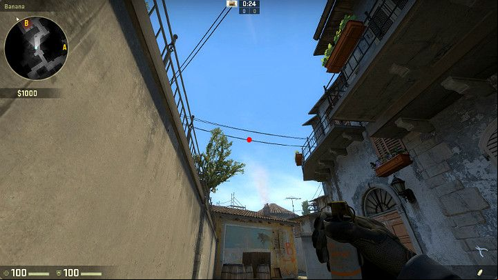 Stand by the crates, right next to the wall of the Banana, and aim at the marked spot - Inferno | Tournament Maps in CS GO - Tournament Maps in Counter Strike: Global Offensive - CS GO Game Guide