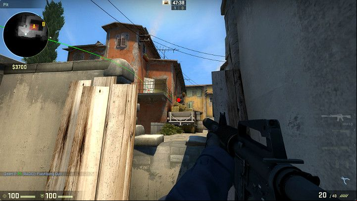 The grenade will bounce off the balcony door and explode above the hay wagon - Inferno | Tournament Maps in CS GO - Tournament Maps in Counter Strike: Global Offensive - CS GO Game Guide