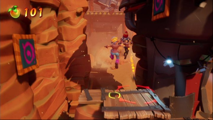 On the other side, you'll find a bomb-using opponent and a wall to climb - Crash 4: Truck Stopped walkthrough - The Hazardous Wasted, 2084 - Crash 4 Guide, Walkthrough