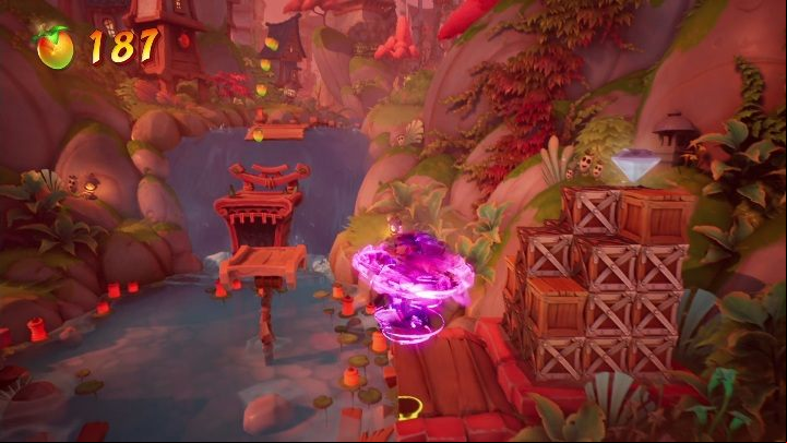 The hidden gem is found on the right side of the map, right in front of the waterfall - Crash 4: Give It a Spin walkthrough - Tranquility Falls, 1402 - Crash 4 Guide, Walkthrough