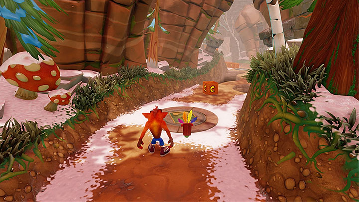 Activate the checkpoint and destroy an Aku Aku chest that neighbors two nitro chests - Diggin It | Crash Bandicoot 2 | Levels - Crash Bandicoot 2 - Alpine Warp Room - Crash Bandicoot N. Sane Trilogy Game Guide