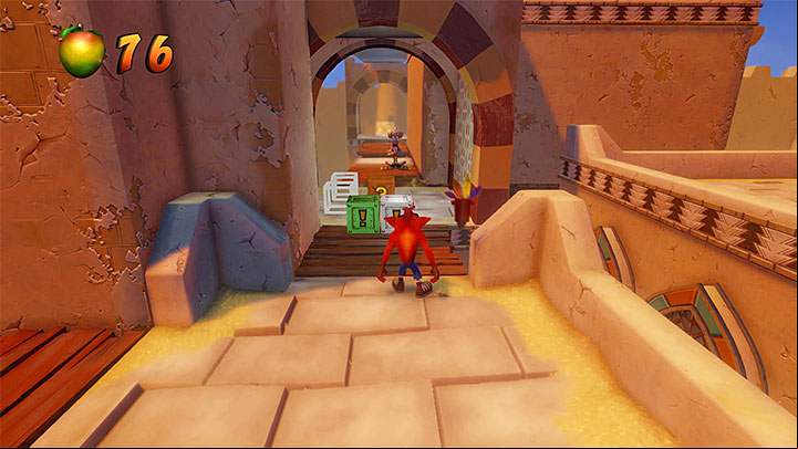 After you have completed the bonus round, bounce off the arrow to grab on to the grate and head deeper into the background - Hang Em High | Crash Bandicoot 3 | Levels - Crash Bandicoot 3 - Arabic location - Crash Bandicoot N. Sane Trilogy Game Guide