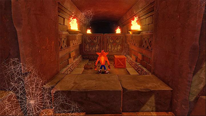 The first trap is located right next to your starting position - spears - Temple Ruins | Wumpa Island | Levels - Crash Bandicoot - Wumpa Island - Crash Bandicoot N. Sane Trilogy Game Guide