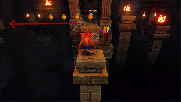 You will need to make your way through another corridor filled with stone blocks coming from the walls - Temple Ruins | Wumpa Island | Levels - Crash Bandicoot - Wumpa Island - Crash Bandicoot N. Sane Trilogy Game Guide