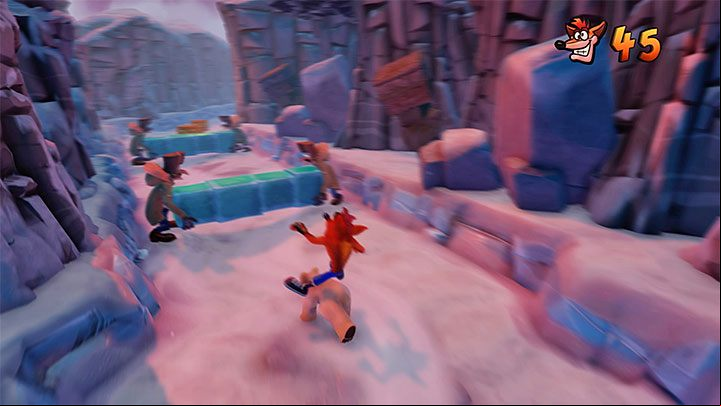 Avoid the seals and another TNT crate on the left - Bear Down | Crash Bandicoot 2 | Levels - Crash Bandicoot 2 - Sewer Warp Room - Crash Bandicoot N. Sane Trilogy Game Guide
