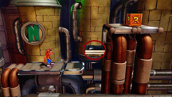Move into the background and head right - Piston It Away | Crash Bandicoot 2 | Levels - Crash Bandicoot 2 - High-Tech Warp Room - Crash Bandicoot N. Sane Trilogy Game Guide