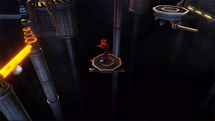 Take several new platforms traveling into further parts of the factory and start jumping over the ledges going up and down, thanks to which you will reach a checkpoint - Generator Room | Cortex Island | Levels - Crash Bandicoot - Cortex Island - Crash Bandicoot N. Sane Trilogy Game Guide