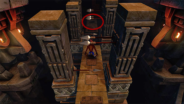 To continue across the main part of ruins, you have to head towards the upper part of the screen and cross another tunnel with stone blocks attempting to crush you (it is a good idea to time well the moments to dash between them - Jaws of Darkness | Cortex Island | Levels - Crash Bandicoot - Cortex Island - Crash Bandicoot N. Sane Trilogy Game Guide