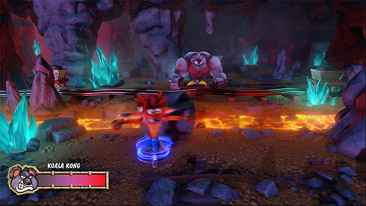Throw the big rock back to the boss in order to hurt him (it will only work if the rock wont hit the cart) - Koala Konked | Crash Bandicoot Trophy Guide - Crash Bandicoot - Crash Bandicoot N. Sane Trilogy Game Guide