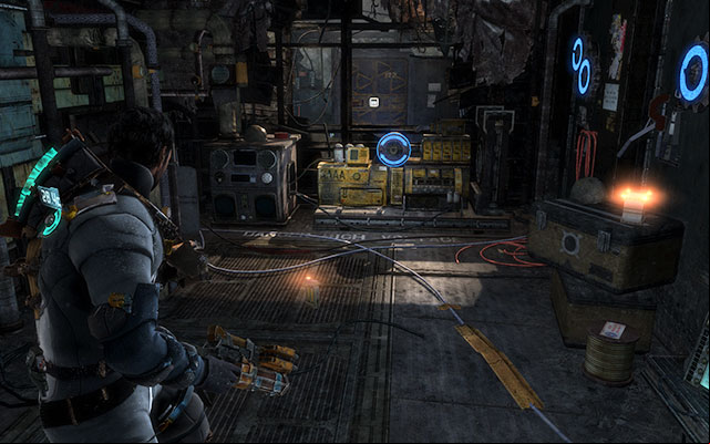 To the right in the room with the generator and the gear - Chapter 9 | Secrets - Secrets - Dead Space 3 Game Guide