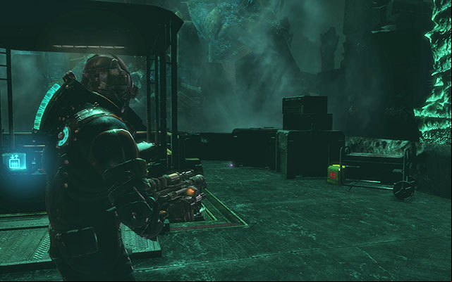 Near crates behind the elevator, after riding it up - Chapter 18 | Secrets - Secrets - Dead Space 3 Game Guide