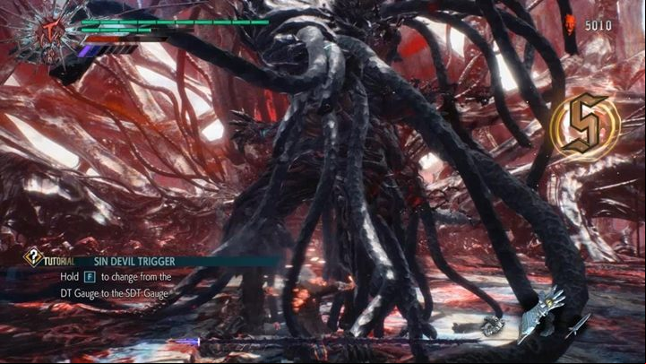 Roll around the enemy, use the Trickster, and the fight should be over soon - Urizen (Mission 12) Boss Fight Guide for DMC5 - Bosses - Devil May Cry 5 Guide